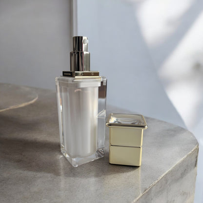 Serum-Pumpflasche Weiss/Gold